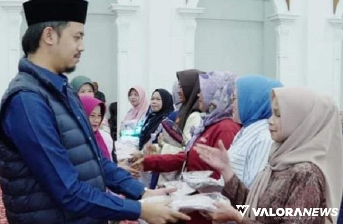 Ratusan Kader Posyandu Kecamatan Guguk Panjang Dibantu Pakaian Kerja