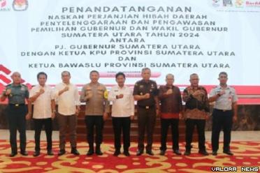 Gubernur Sumut, Hassanudin bersama Agus Arifin (Ketua KPU)...